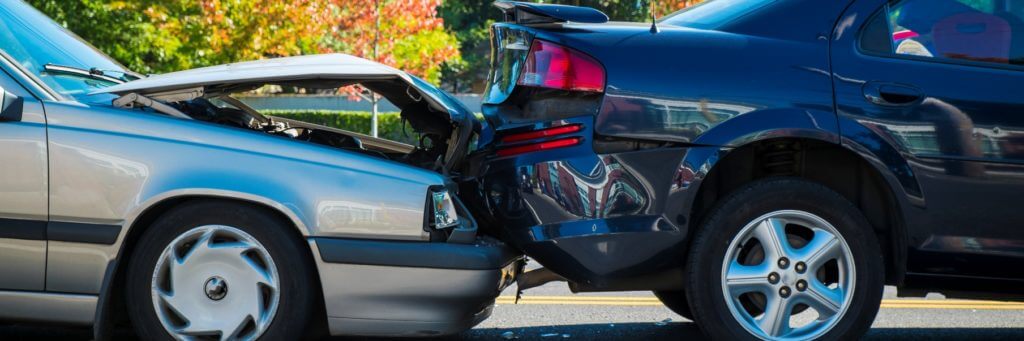 photo of two cars that got into an accident