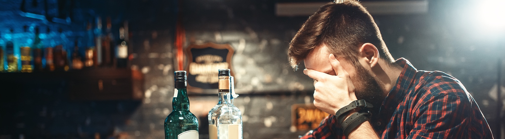 Alcoholic Sitting At Bar And Drinks Strong Alcohol