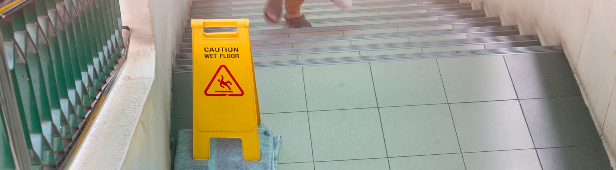 Yellow Sign That Alerts For Wet Floor.