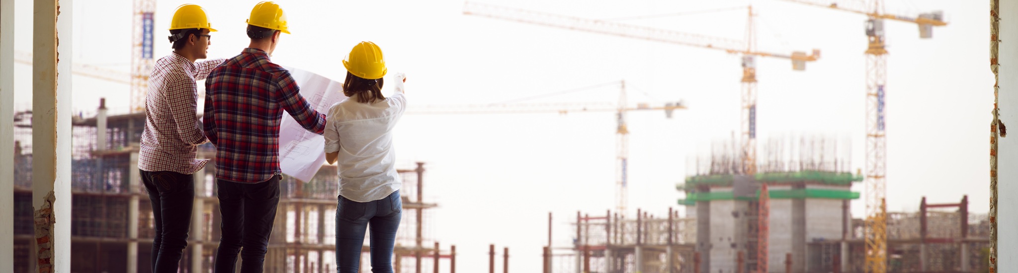 Engineer Group And Worker Meeting, Discussion With Construction Blueprint On Site Work And Point Finger To The Site Workplace